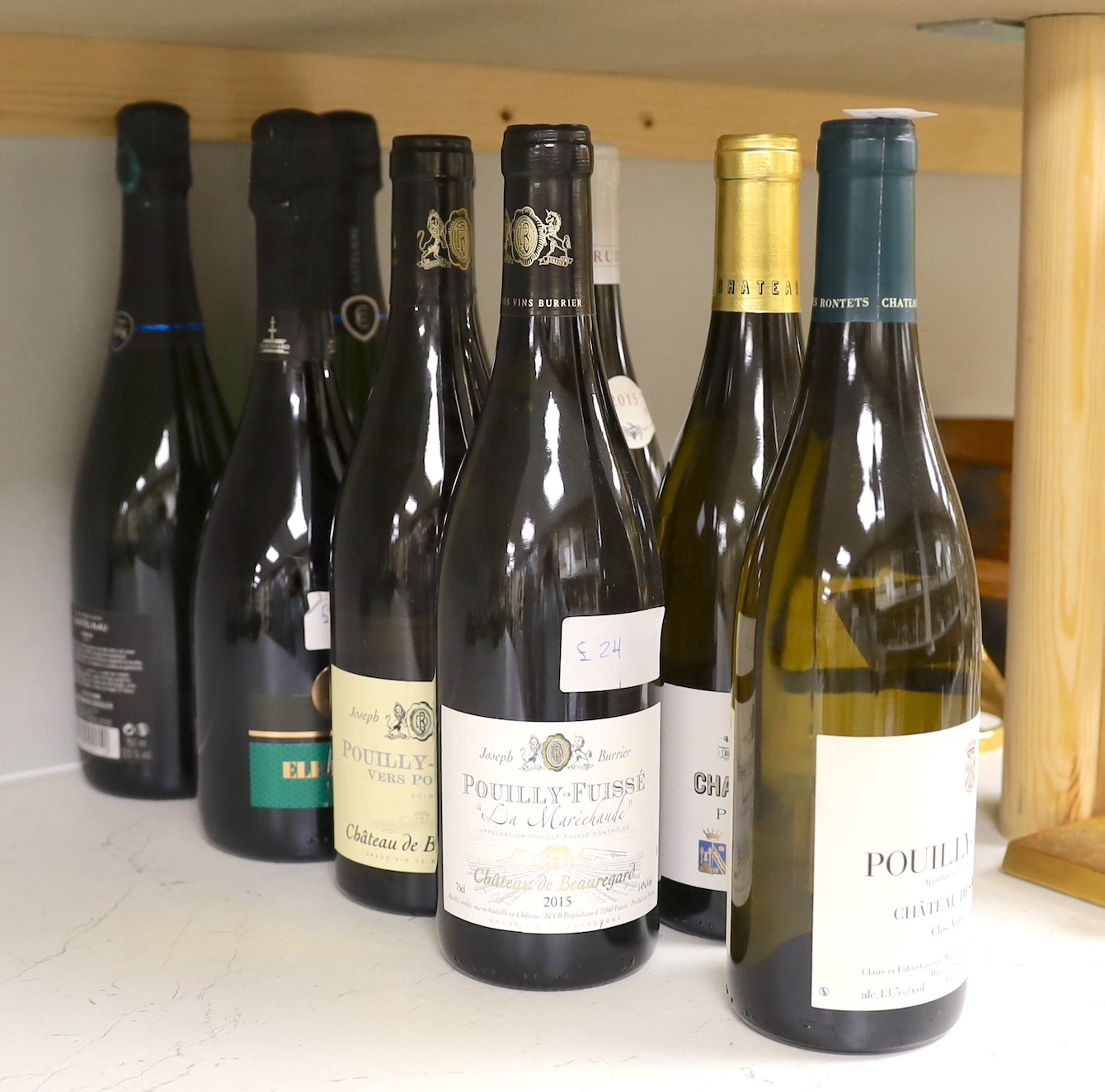 Six bottles of Pouilly-Fuisse, together with two bottles and champagne, and a bottle of Fiasconaro, (9)